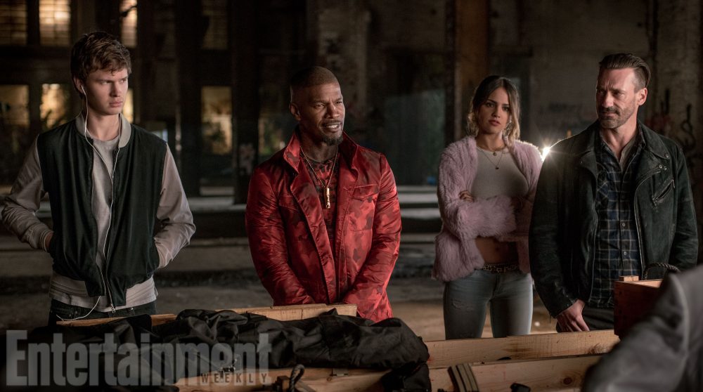 (l to r) Baby (ANSEL ELGORT), Bats (JAMIE FOXX), Darling (EIZA GONZALEZ) and Buddy (JON HAMM) in the abandoned rail yard to negotiate a deal in TriStar Pictures' BABY DRIVER.