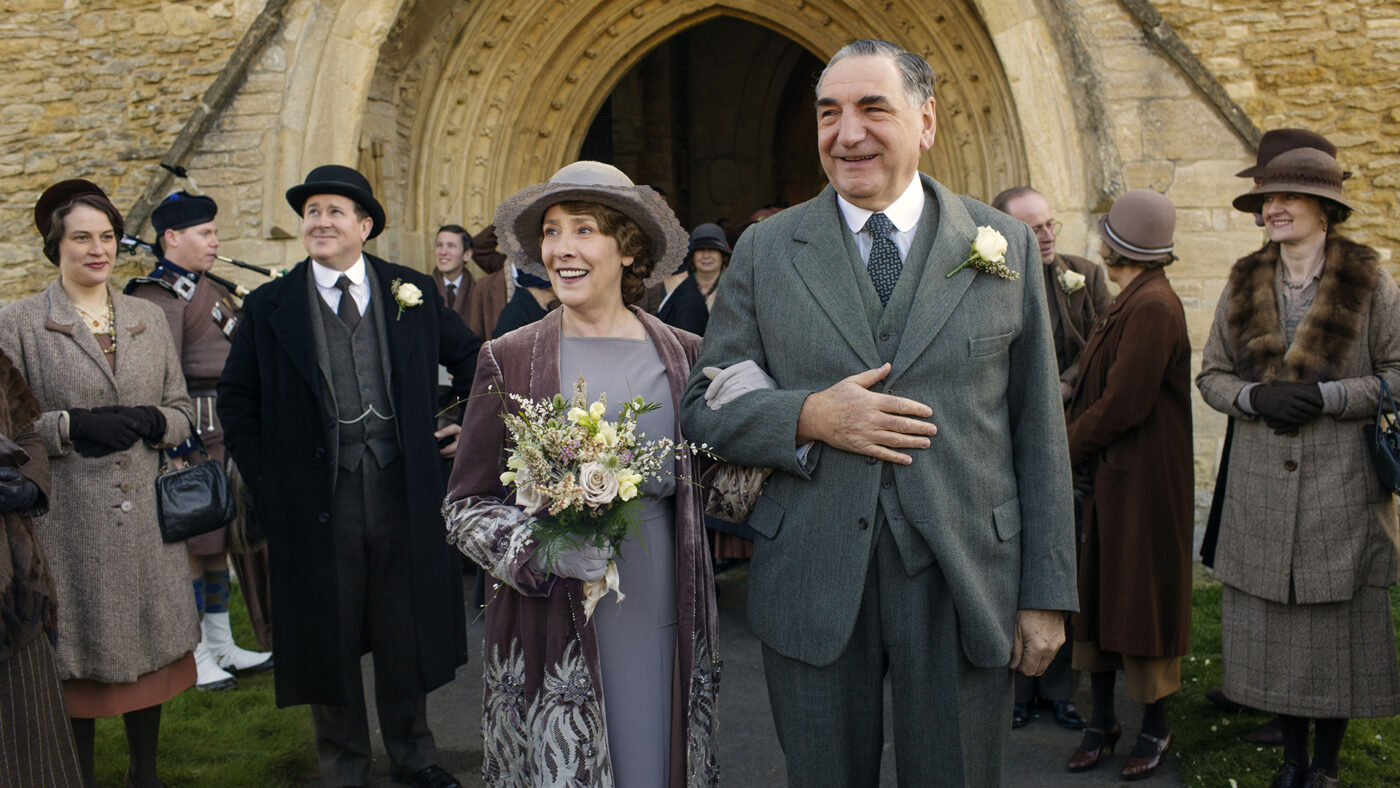 Downton Abbey Part Three - Sunday, January 17, 2016 at 9pm ET on MASTERPIECE on PBS A wedding dress drama takes a disastrous turn. The breakfast battle is settled. A handsome volunteer helps Edith meet a deadline. The hospital debate gets nasty. Shown from left to right: Phyllis Logan as Mrs. Hughes and Jim Carter as Mr. Carson (C) Nick Briggs/Carnival Film & Television Limited 2015 for MASTERPIECE This image may be used only in the direct promotion of MASTERPIECE CLASSIC. No other rights are granted. All rights are reserved. Editorial use only. USE ON THIRD PARTY SITES SUCH AS FACEBOOK AND TWITTER IS NOT ALLOWED.